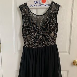 Black Yumi Kim dress with silver accents